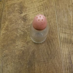 Vintage Salt or pepper shaker glass w Pink plastic lid
